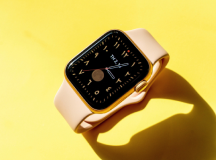 a watch on a yellow background